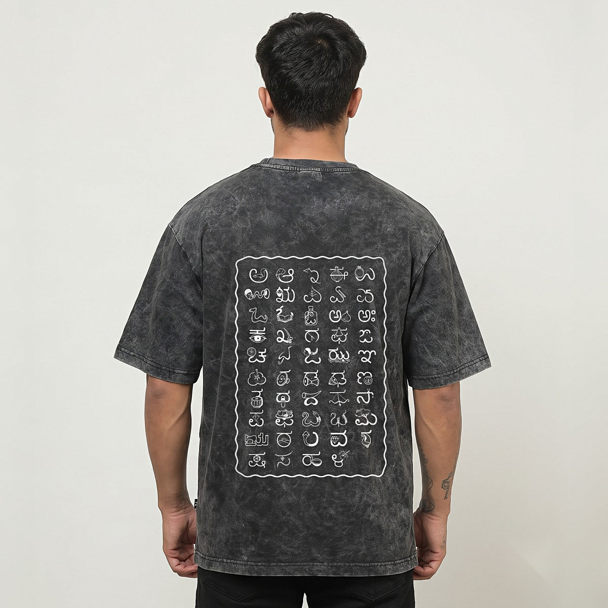 Kannada Varnamale — Big Back Print, Flag Stripe Front — Charcoal Acid Wash — back view