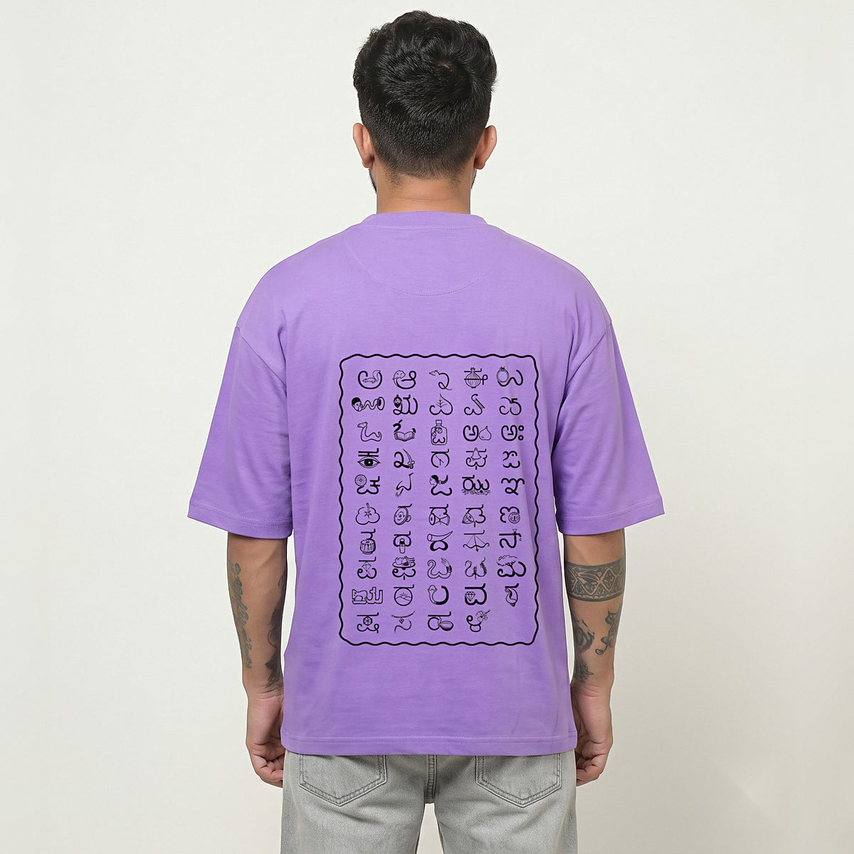 Kannada Varnamale — Big Back Print, Flame Logo Front — Lilac — back view
