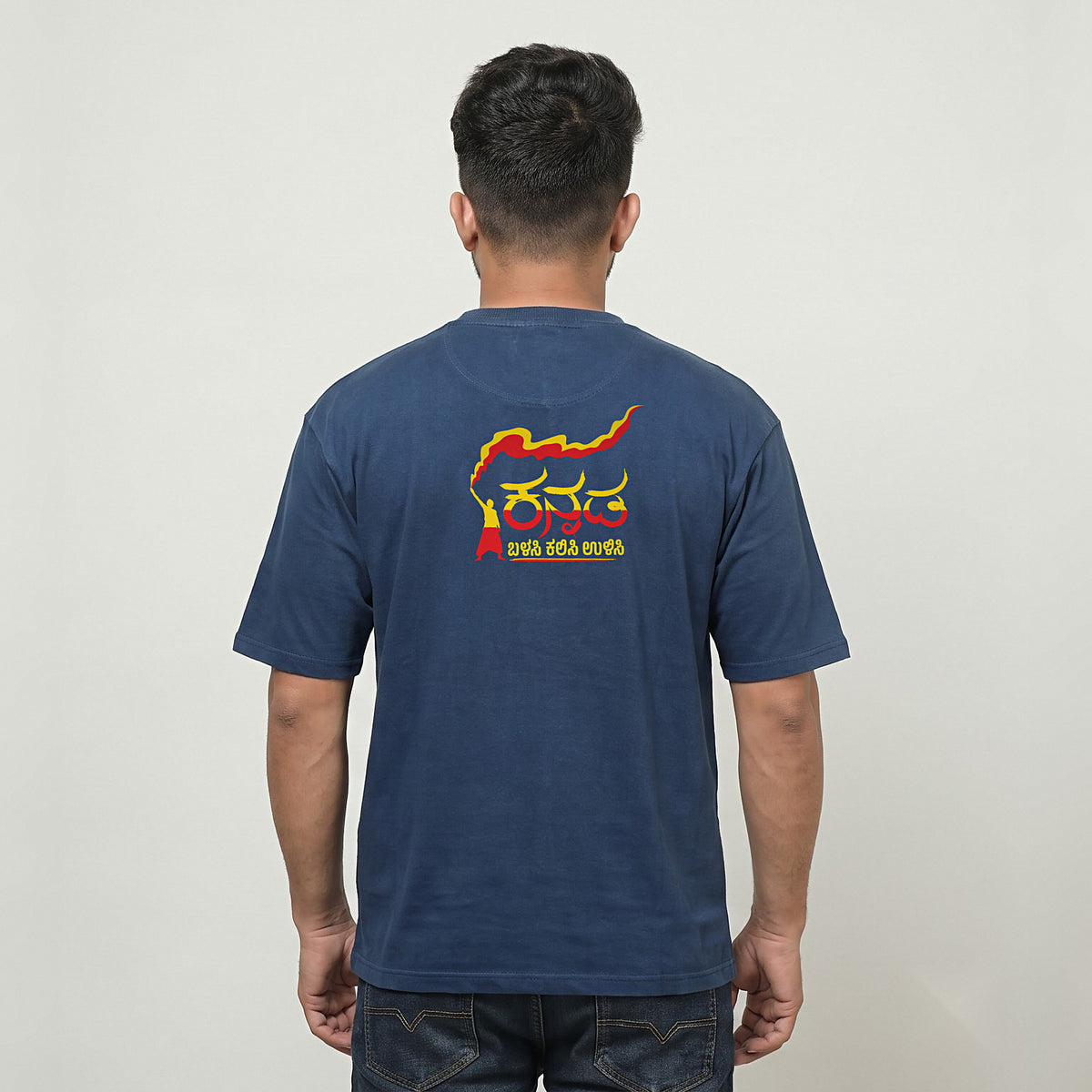 Kannada Flame Logo — Back Print, Flag Stripe Front — Navy Blue — back view